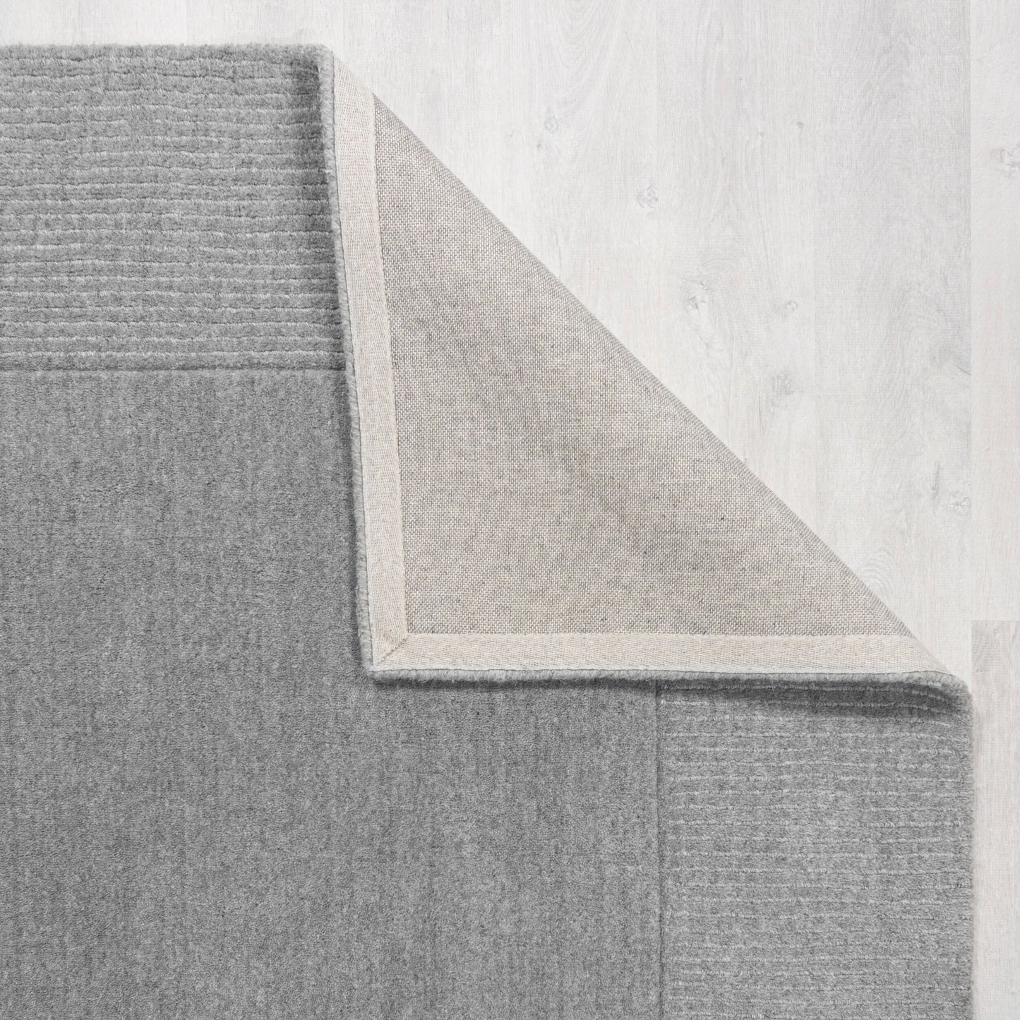 Tapis de salon uni en laine LEONE