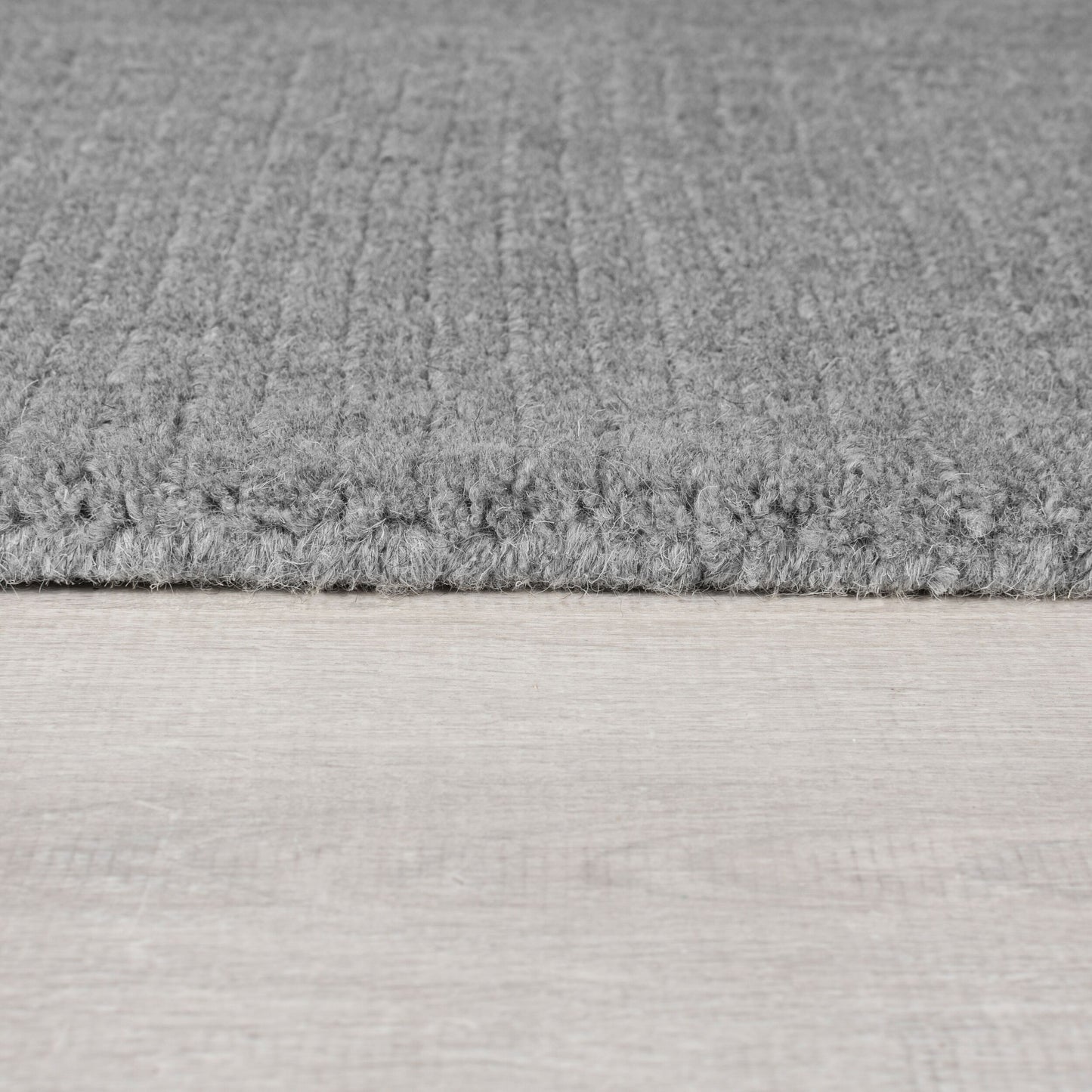 Tapis de salon uni en laine LEONE