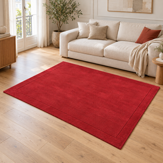 Tapis de Salon Moderne uni Pure Laine CANDY Rouge entièrement visible dans un salon lumineux — photo ambiance