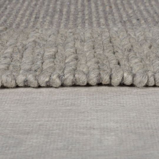 Tapis de salon design tressé en laine PILAT